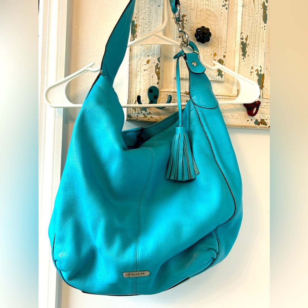 Beautiful turquoise Coach purse